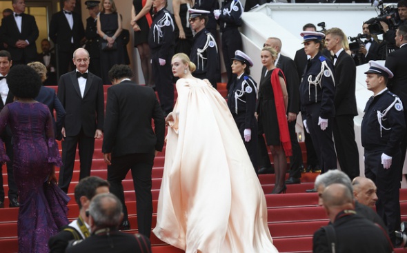 Jury president Alejandro Gonzalez Inarritu, left, and jury member Elle Fanning arrive at the opening ceremony and the premiere of the film 'The Dead Don't Die' at the 72nd international film festival, Cannes, southern France, Tuesday, May 14, 2019. (Photo by Arthur Mola/Invision/AP)