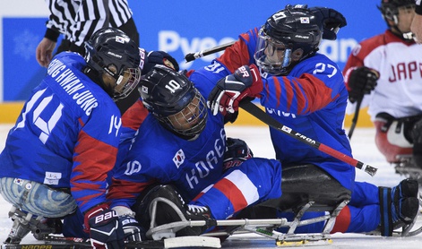 South Korean team players celebrate during the Ice Hockey Group B Preliminary Game between at the Gangneung Hockey Centre at the Paralympic Winter Games in Pyeongchang, South Korea, Saturday, March 10, 2018. (Joel Marklund/OIS/IOC via AP)