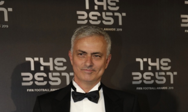 FILE - In this Sept. 23, 2019, file photo, Jose Mourinho arrives to attend the Best FIFA soccer awards, in Milan's La Scala theater, northern Italy. Tottenham has hired Mourinho as manager, a day after firing Mauricio Pochettino. (AP Photo/Luca Bruno, File)