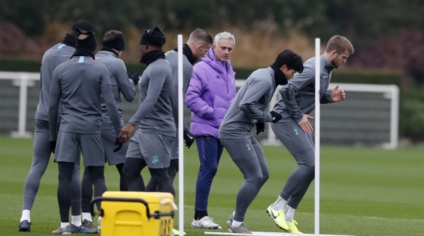 Tottenham Hotspur's manager Jose Mourinho watches his players during a training session at their training ground in London, Monday Nov. 25, 2019, ahead of their Champions League Group B soccer match against Olympiakos on Tuesday. (AP Photo/Alastair Grant)